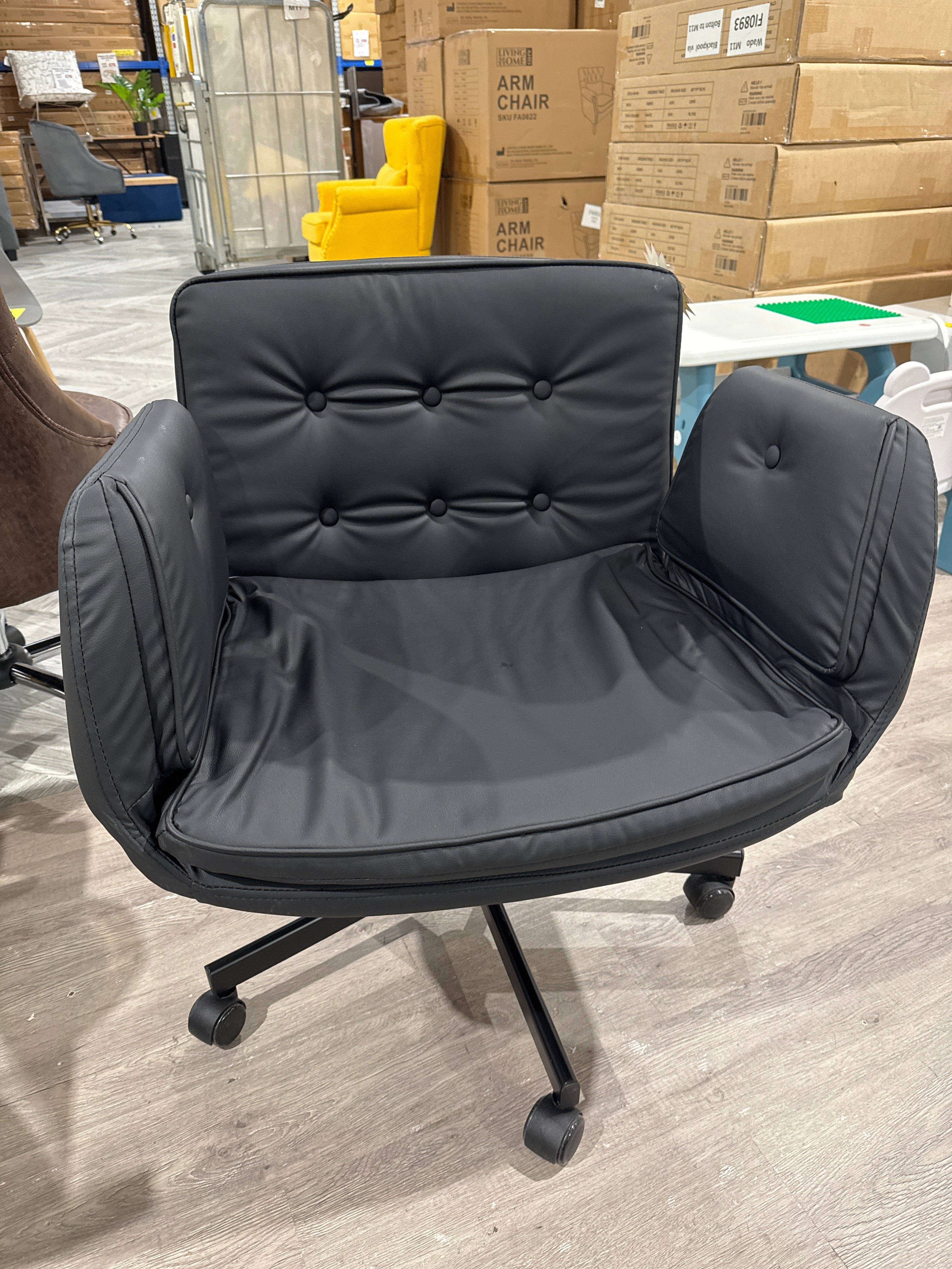 Black Office Chair with Armrests and Wheels