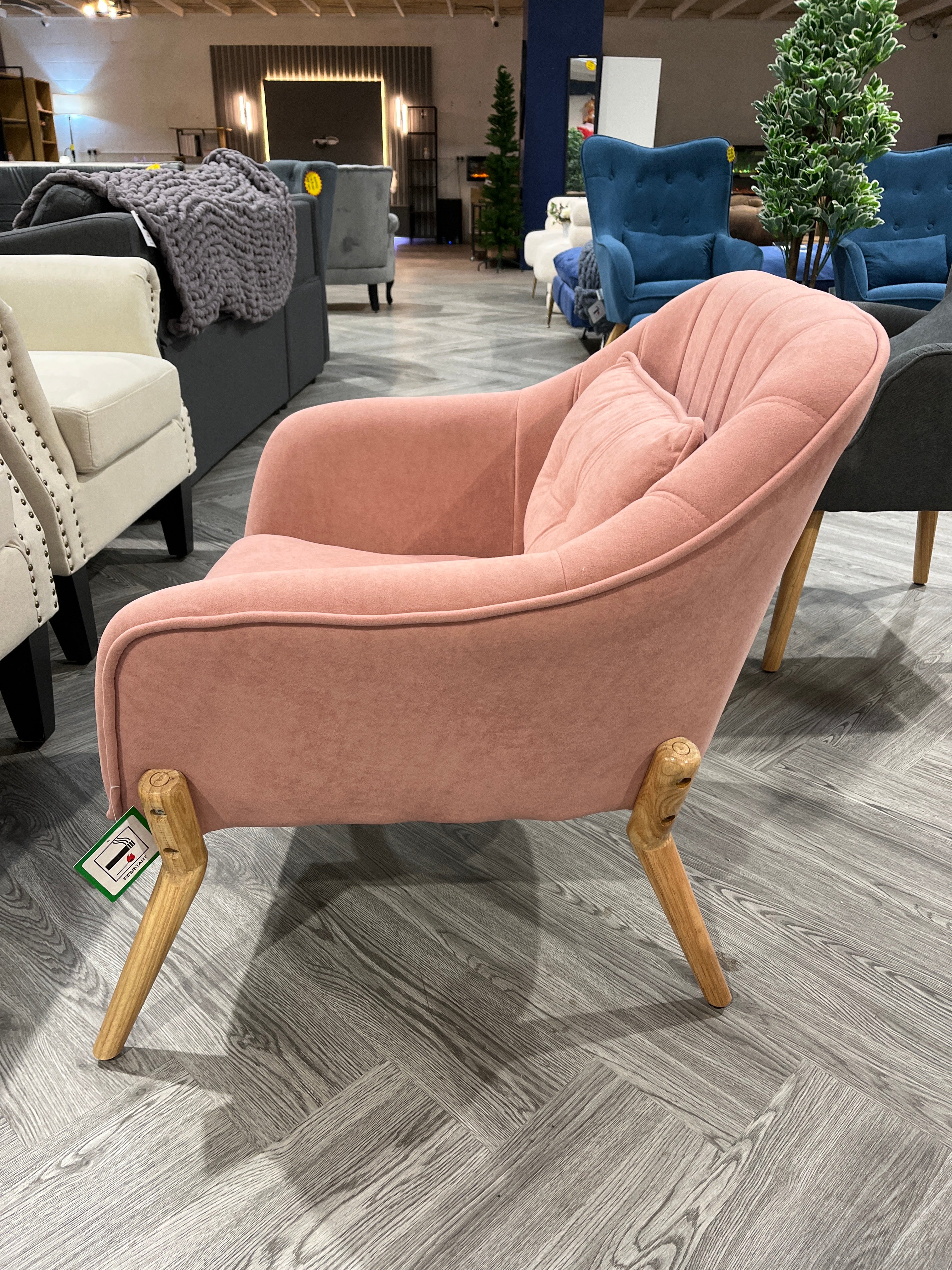 Pink Armchair with Wooden Legs and Cushion