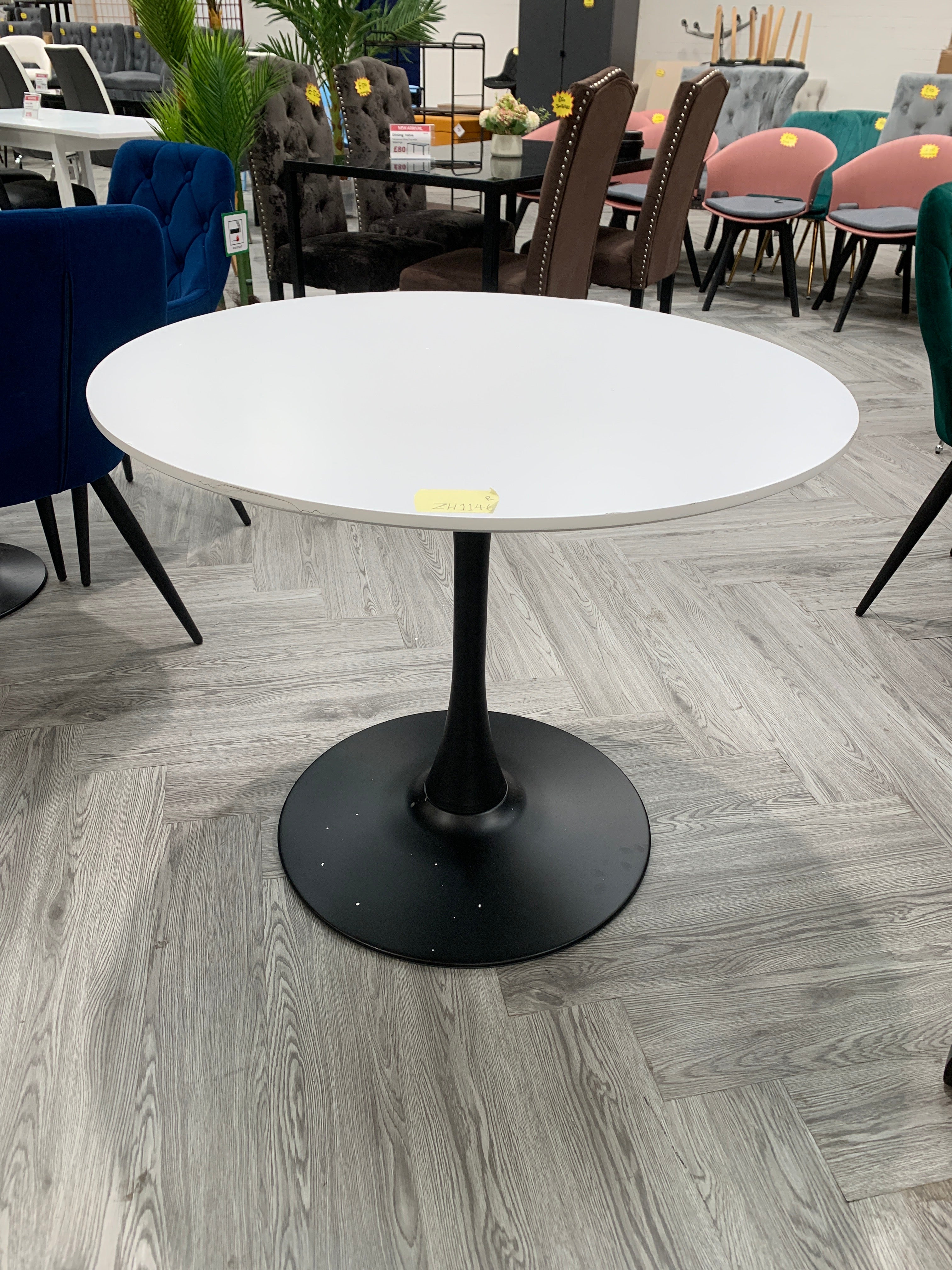 White Modern Round Wooden Table with Metallic Base